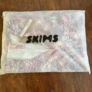 SKIMS Pink and Black Animal Print Set